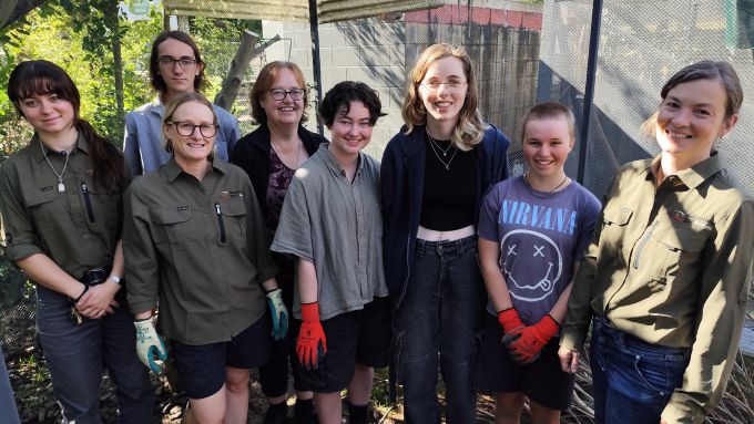 Nayland College rangatahi with their teacher and Natureland Zoo Nelson staff members standing in the new Kea breeding aviary
